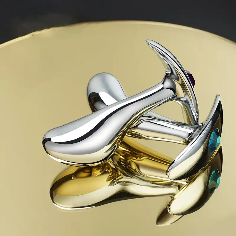 Two metal butt plugs