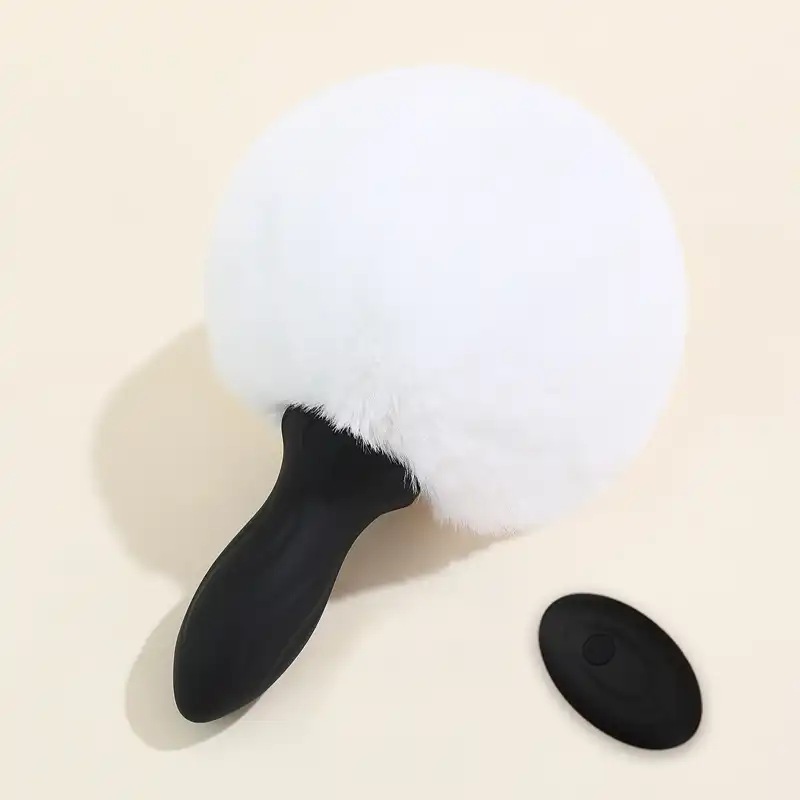 White bunny tail with black vibrating butt plug