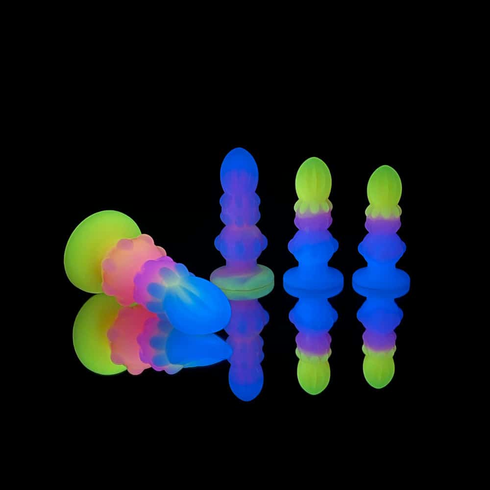 four different size Luminous anal toys