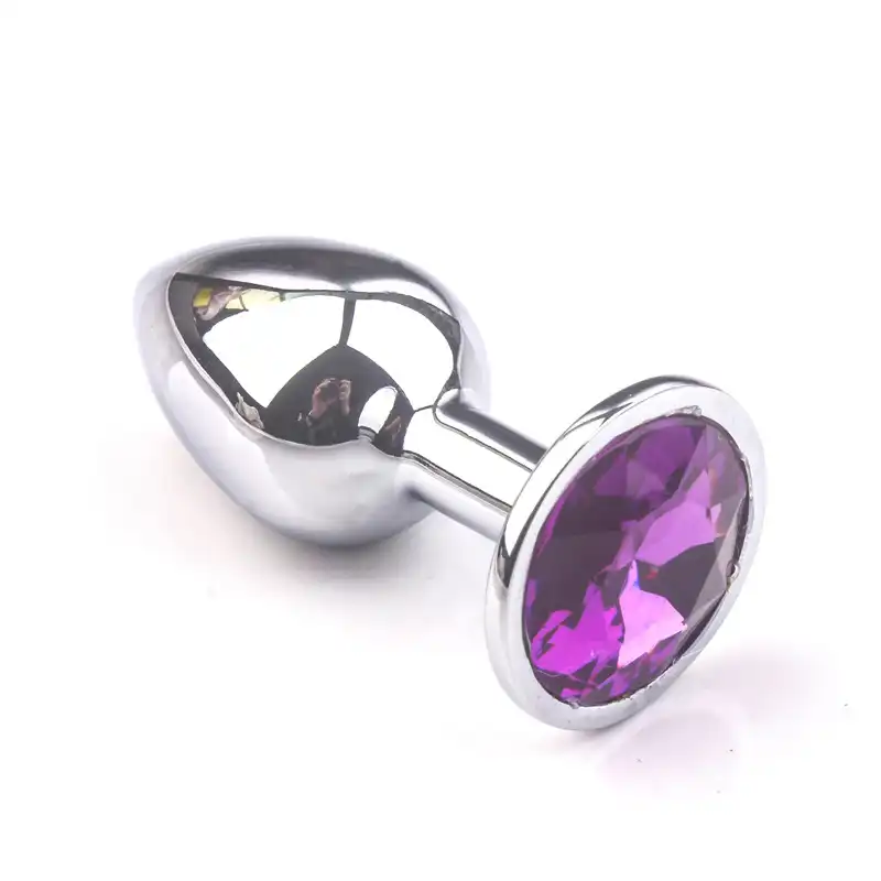 Metal butt plug with a purple jewel for women