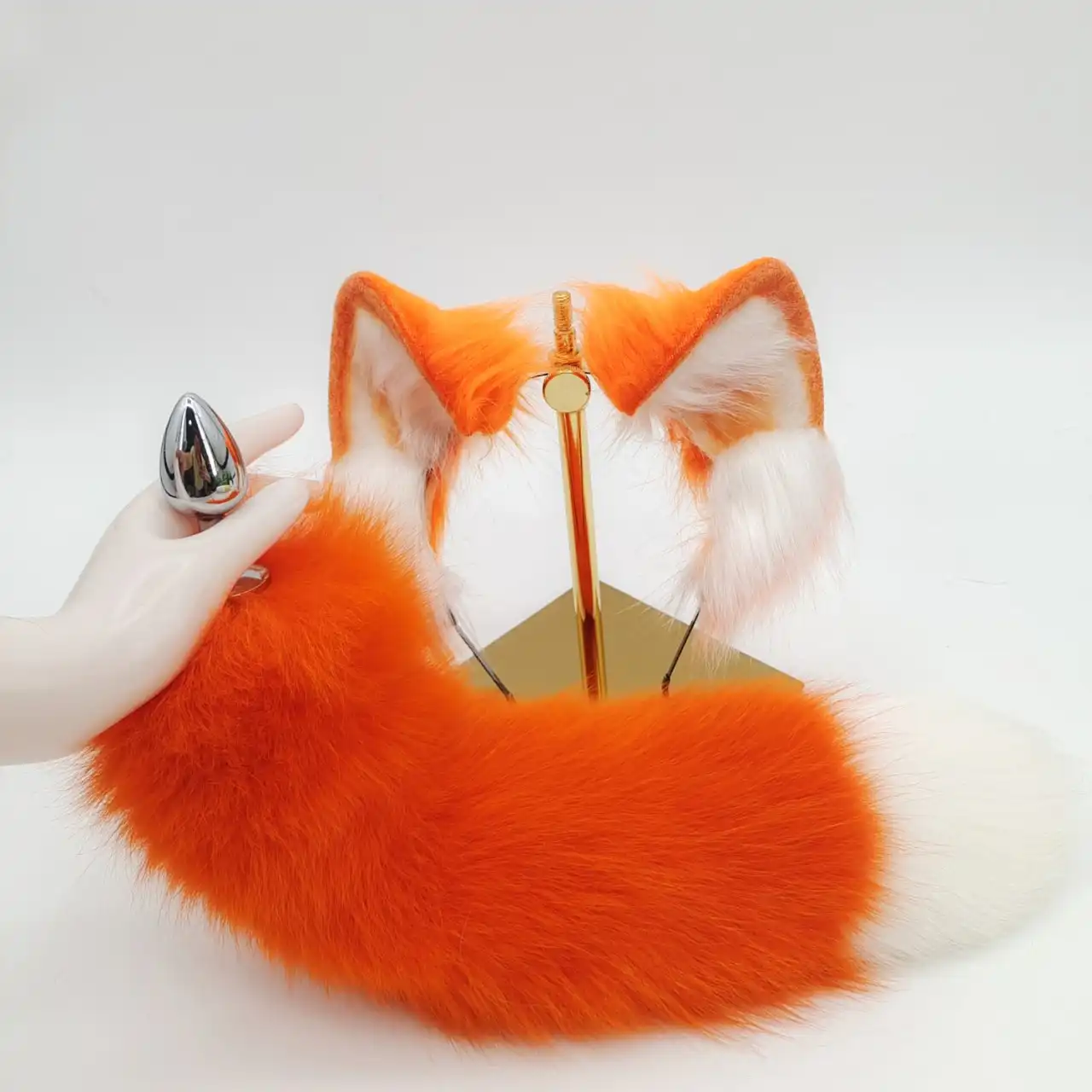 Orange fox tail butt plug set