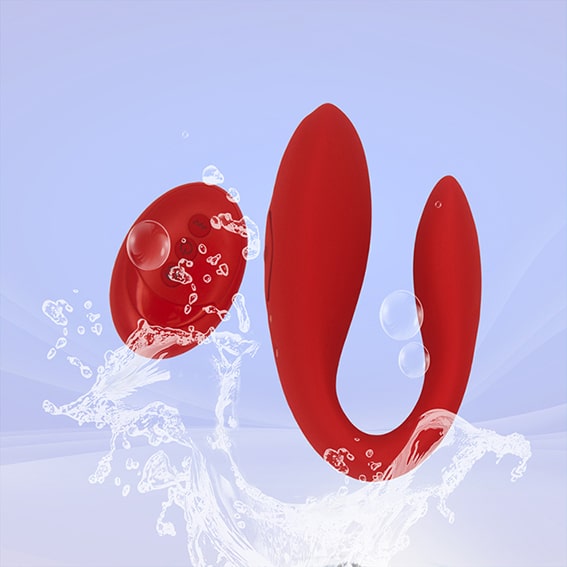 A red remote control vibe couples vibrator in the splashing water