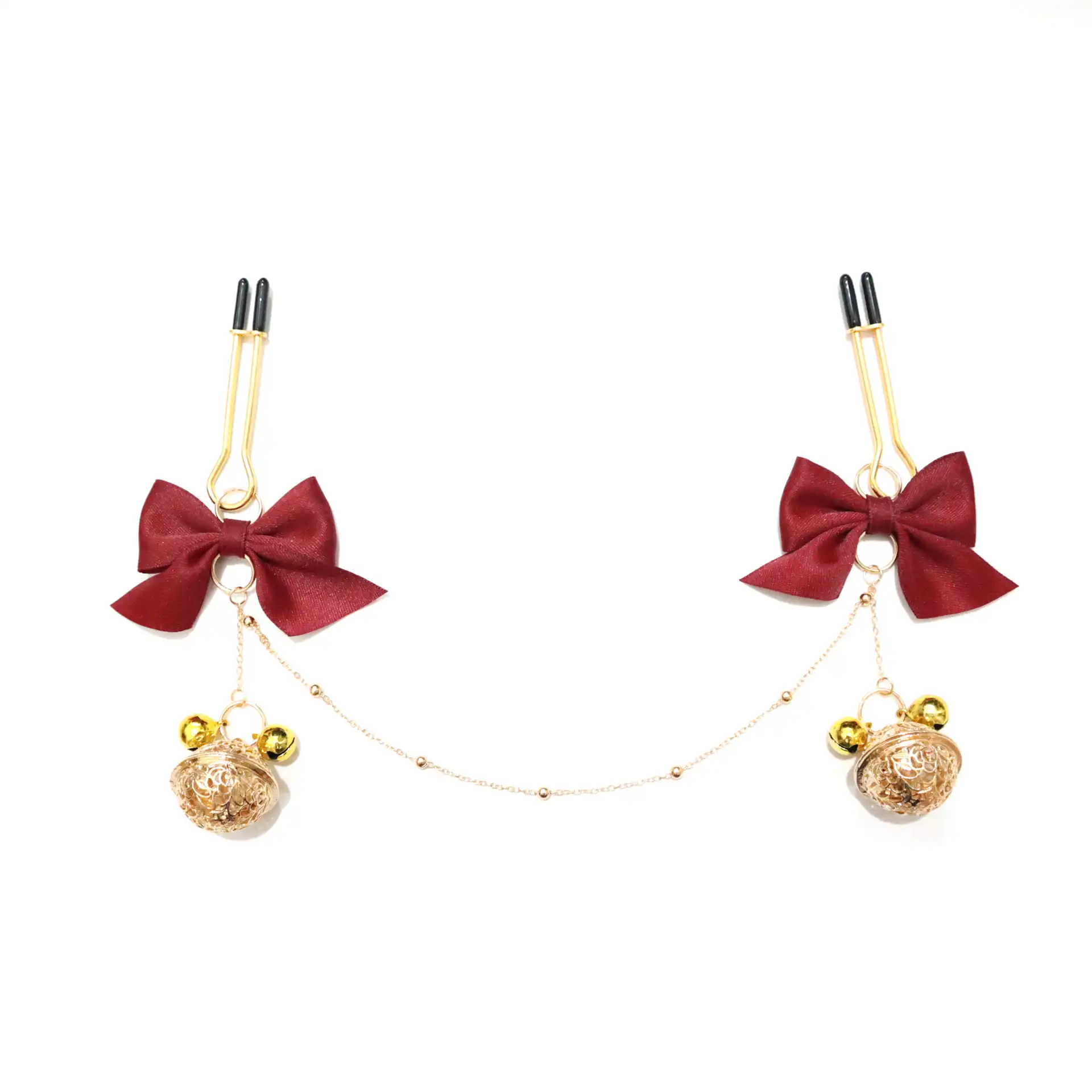 Butterfly nipple clamps with bells