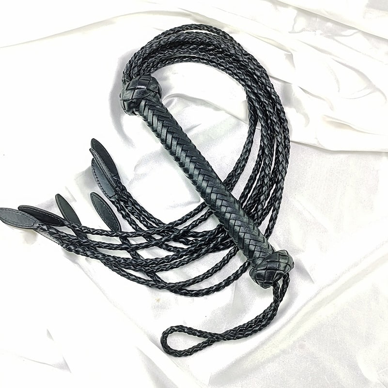 Lush black nine spike flogger