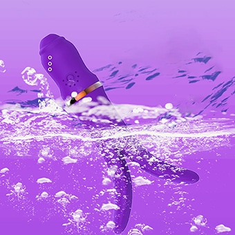 A purple Y -shaped vibrator is in the water