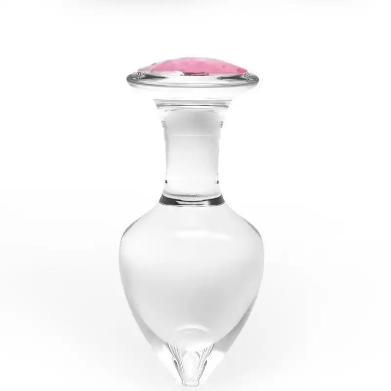 Clear glass butt plug with a pink jewel