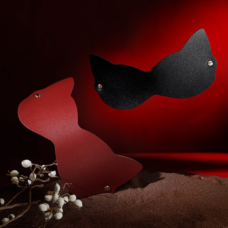 Two blindfolds for BDSM in the picture one red and one black